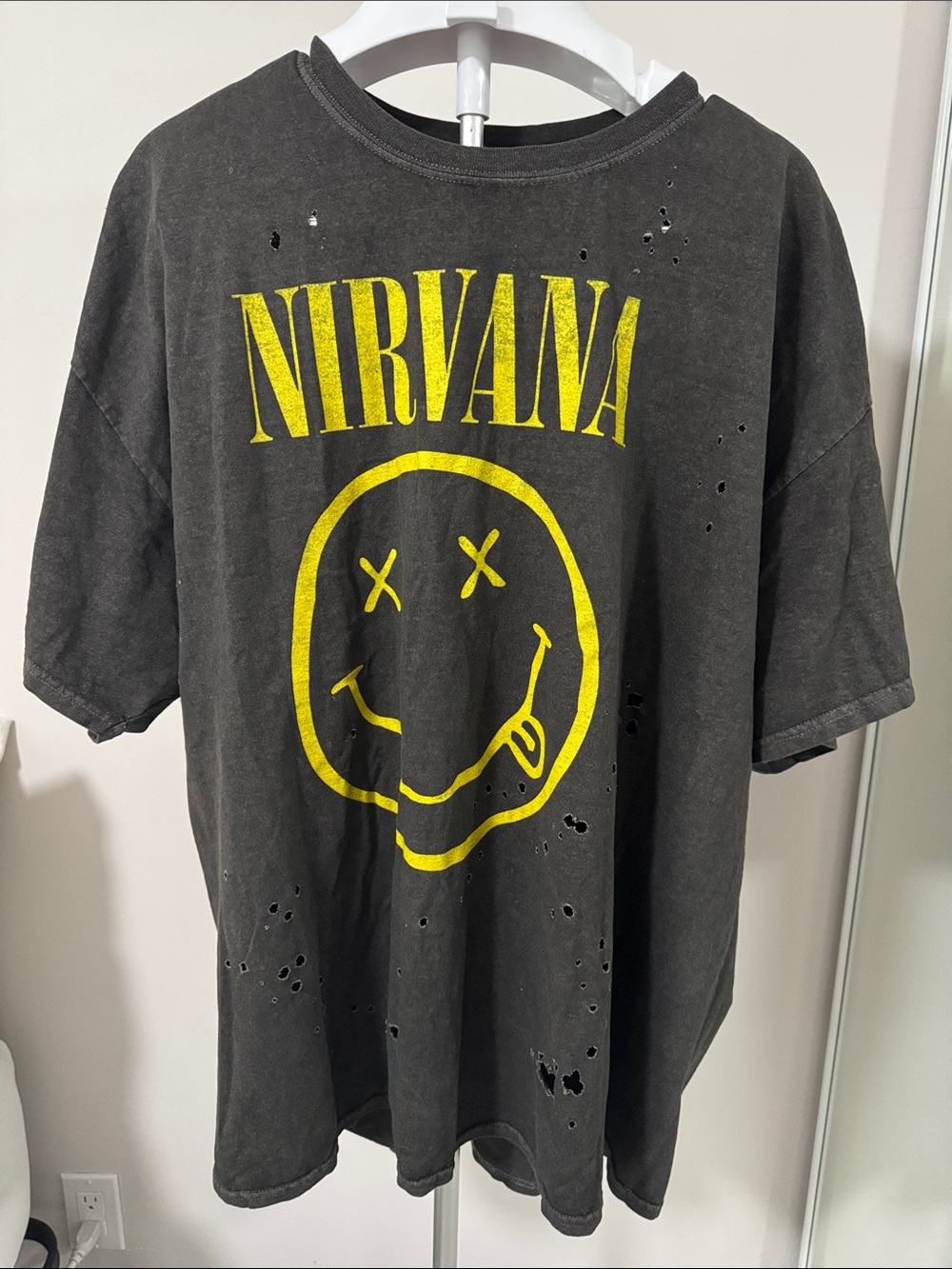 NIRVANA Black Tee with Yellow Smiley Logo